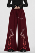 PINK ABSTRACT FLARE HEM TROUSER - MAROON
